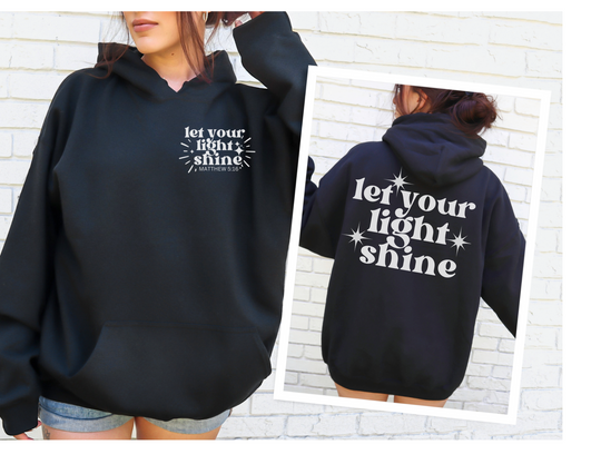 Unisex Let Your Light Shine Hoodie: A cozy blend of cotton and polyester, featuring a kangaroo pocket and matching drawstring. Ideal for chilly days. Classic fit, tear-away label. Sizes S-5XL.
