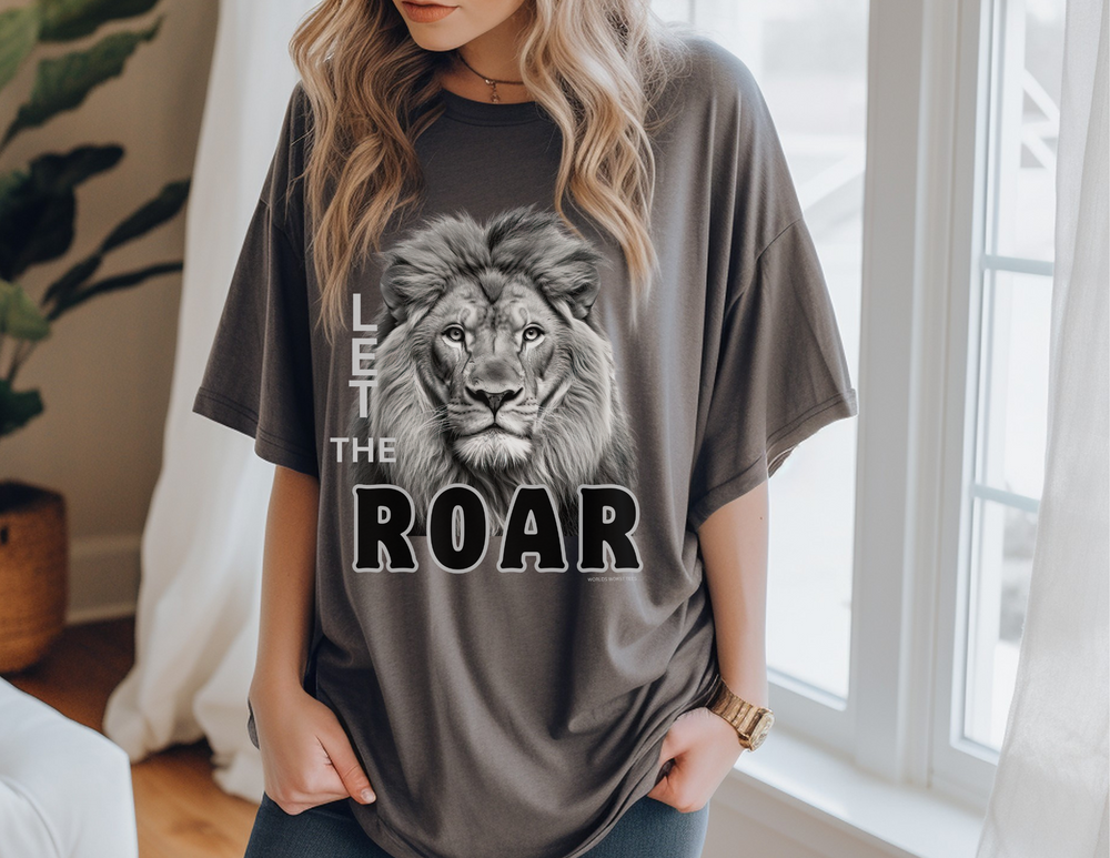 A grey tee featuring a lion design, embodying strength and style. Unisex jersey tee with ribbed knit collar, 100% Airlume combed cotton, and tear-away label. Perfect for a casual, fashion-forward look.