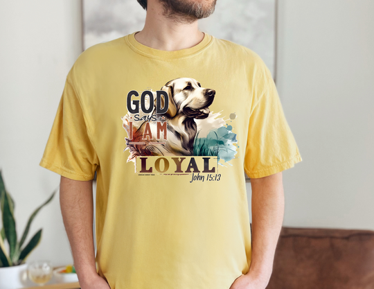 A man in a yellow Loyal Tee, showcasing a relaxed fit garment-dyed t-shirt made of 100% ring-spun cotton. Durable double-needle stitching and seamless design for comfort.