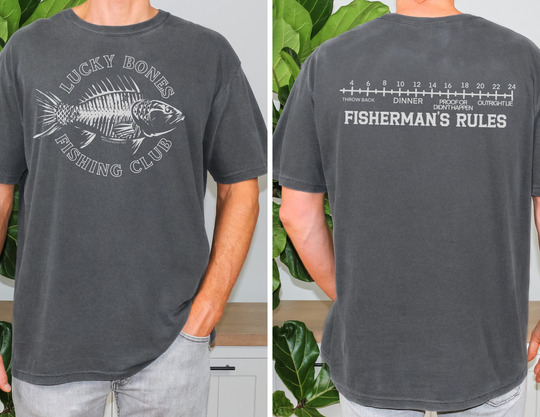 A Lucky Bones Fishing Club Tee: Garment-dyed, 100% ring-spun cotton shirt. Soft-washed for coziness, with a relaxed fit and durable double-needle stitching. No side-seams for a tubular shape.