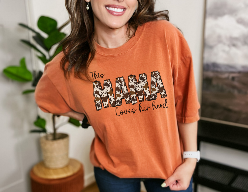 A relaxed fit Mama Herd Tee, crafted from 100% ring-spun cotton for ultimate comfort. Garment-dyed with double-needle stitching for durability, this tee features a soft-washed fabric and a tubular shape.