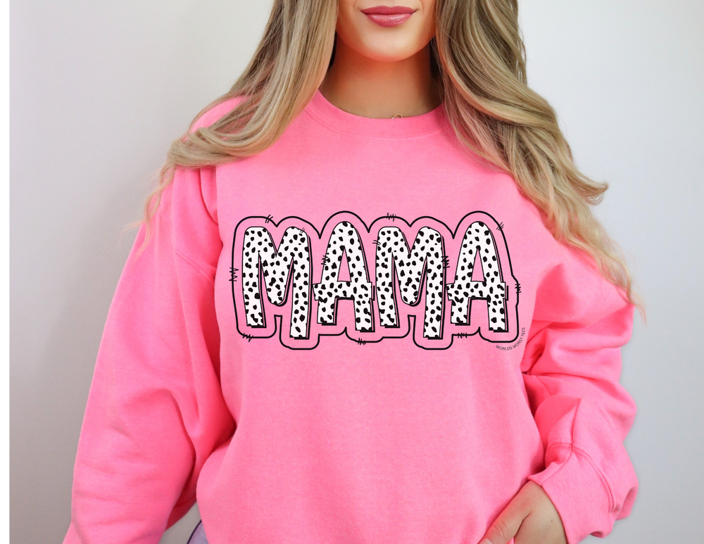 A Mama Print Crew unisex heavy blend sweatshirt in pink, worn by a woman. Features ribbed knit collar, no itchy seams, and a loose fit. Made of 50% cotton and 50% polyester.