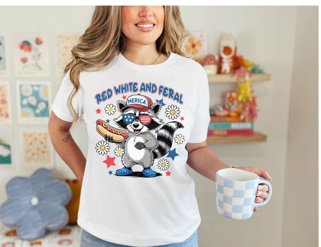 Red White and Feral 4th Tee, a classic unisex jersey short sleeve, offers a comfortable fit with ribbed knit collars and dual side seams for durable shape retention.