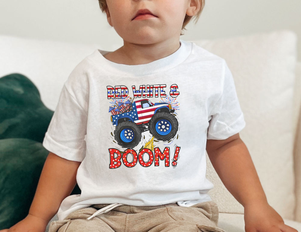 A toddler tee featuring a child sitting on a couch, perfect for sensitive skin. Made of 100% combed ringspun cotton, light fabric, tear-away label, and a classic fit. Ideal for first ventures.