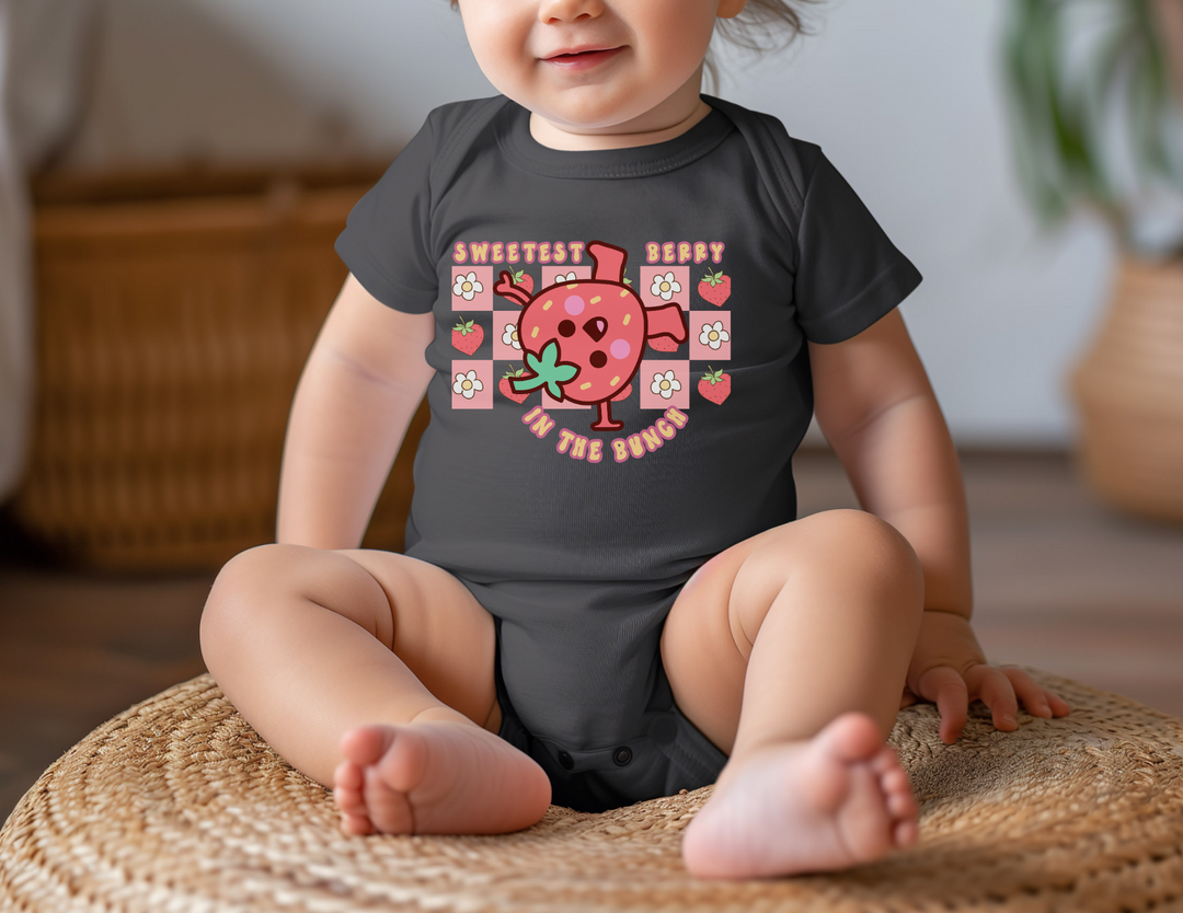 Infant bodysuit titled Sweetest Berry in the Bunch Onesie, showcasing a soft, unisex design with lap shoulders, ideal for easy dressing and comfort.
