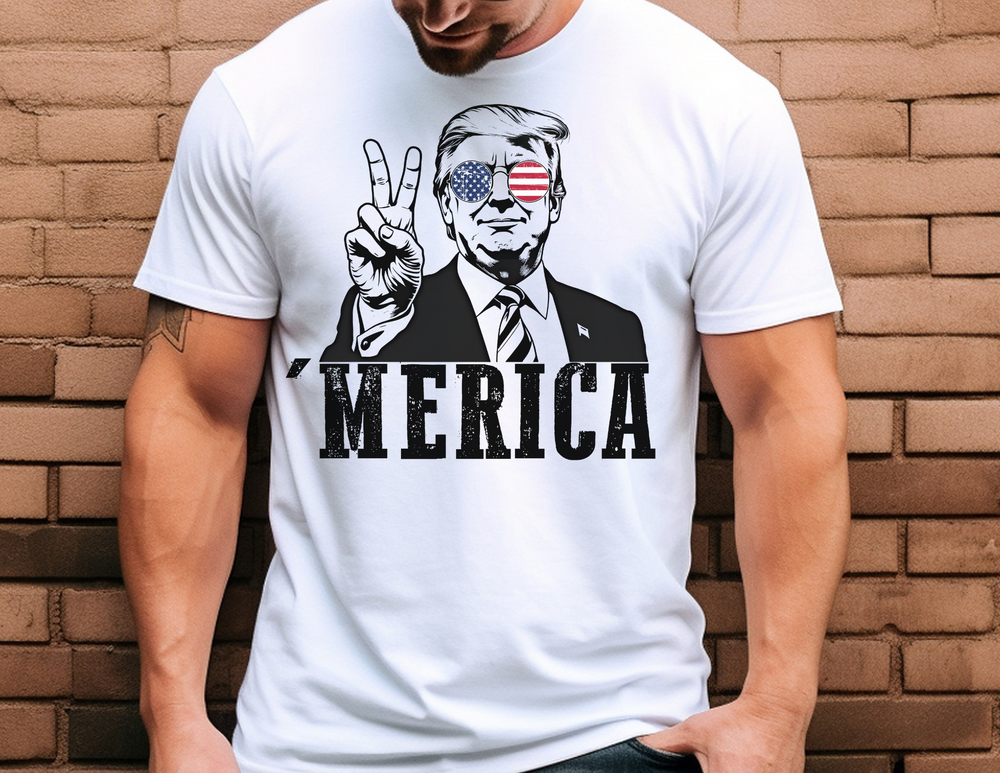 Trump 'Merica Tee: A classic unisex jersey short sleeve shirt with ribbed knit collars, tapered shoulders, and dual side seams for lasting shape.