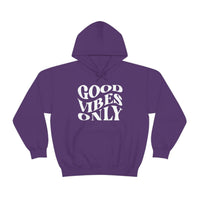A cozy Good Vibes Only Hoodie, featuring white text on a purple background. Unisex, cotton-polyester blend, kangaroo pocket, and drawstring hood. Classic fit, tear-away label, medium-heavy fabric. From Worlds Worst Tees.