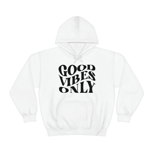 A cozy Good Vibes Only Hoodie in white with black text. Unisex heavy blend, cotton-polyester fabric, kangaroo pocket, and drawstring hood. Perfect for relaxation and warmth.