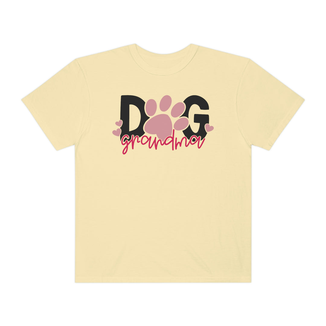 A relaxed fit Dog Grandma Tee in yellow with a paw print design. 100% ring-spun cotton, garment-dyed for coziness. Durable double-needle stitching, tubular shape. Ideal for daily wear.