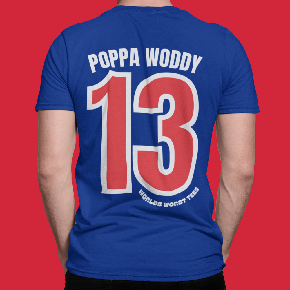 A premium LA Dongers #13 Poppa Woody Tee for men, featuring a blue shirt with red text and a number. Comfy, light, ribbed collar, and roomy fit. Ideal for workouts and daily wear.