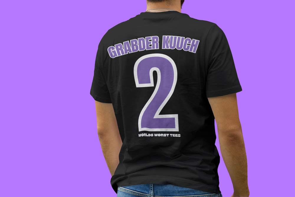 A premium fitted men’s Colorado Rockhards #2 Grabder Kuuch Tee, featuring a black shirt with a purple number and text. Comfy, light, ribbed knit collar, side seams for shape, 100% cotton.