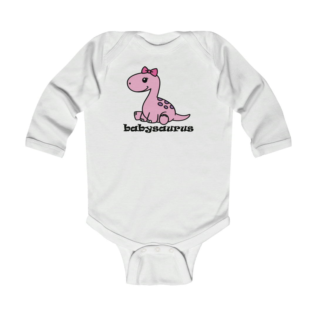 A white baby bodysuit featuring a pink dinosaur design, ideal for infants. Made of soft, durable cotton with plastic snaps for easy changes. Perfect for comfort and style.