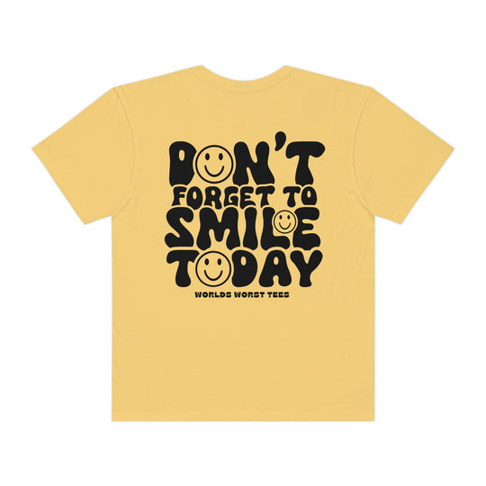 A relaxed-fit, ring-spun cotton tee featuring Don't Forget To Smile Today text. Garment-dyed for coziness, with double-needle stitching for durability and a seamless design for a tubular shape.