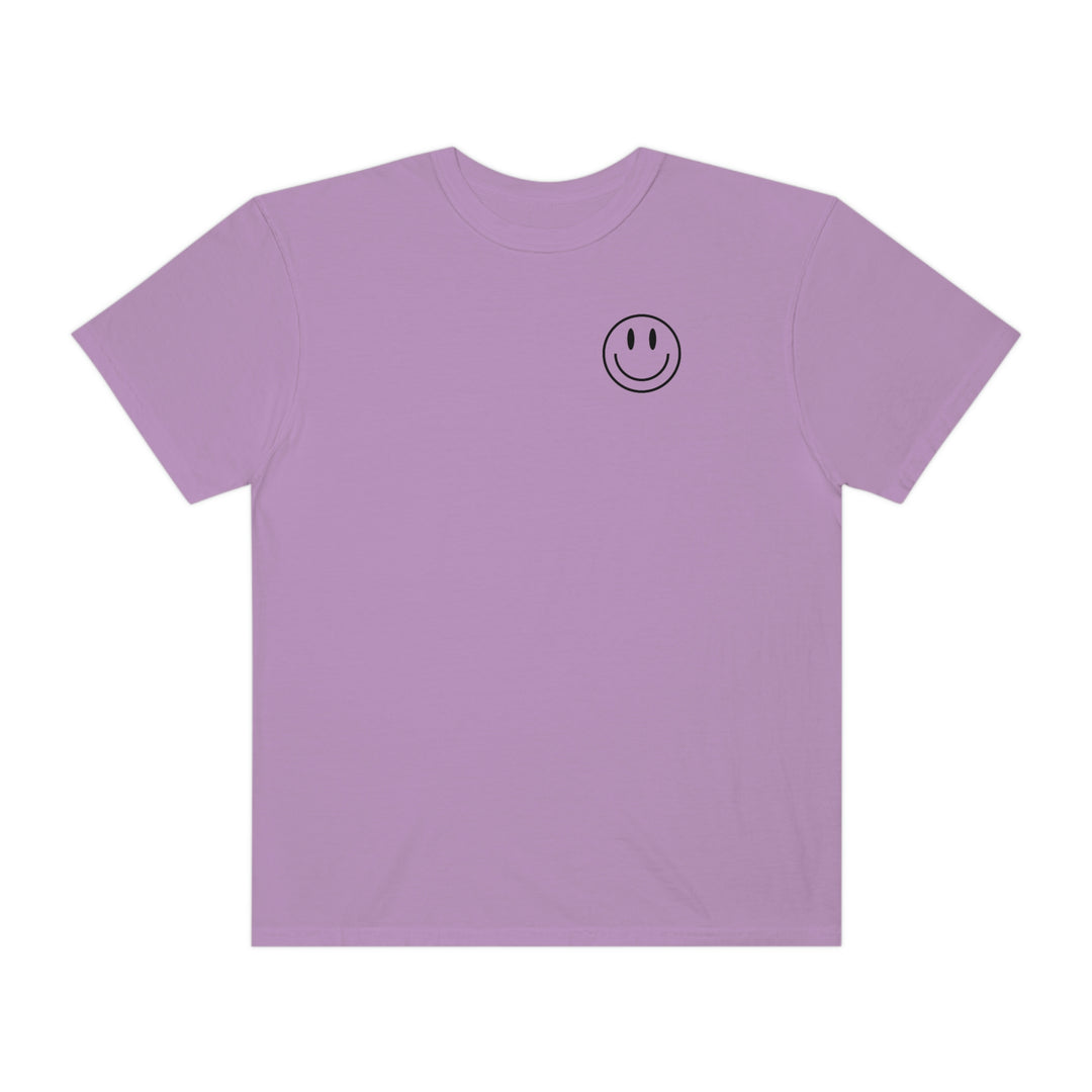 Don't Forget To Smile Today Tee: A purple t-shirt with a smiley face design, crafted from 100% ring-spun cotton. Features a relaxed fit, double-needle stitching, and seamless sides for durability and comfort.