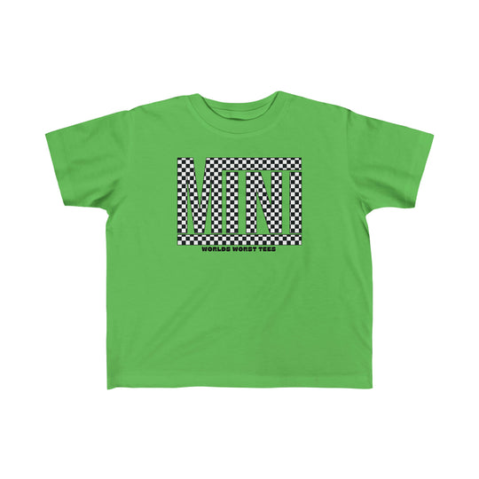 A Vans Mini Toddler Tee, featuring a green shirt with black and white checkered designs. Made of soft 100% combed cotton, perfect for sensitive skin. Ideal for first adventures, with a classic fit and tear-away label.
