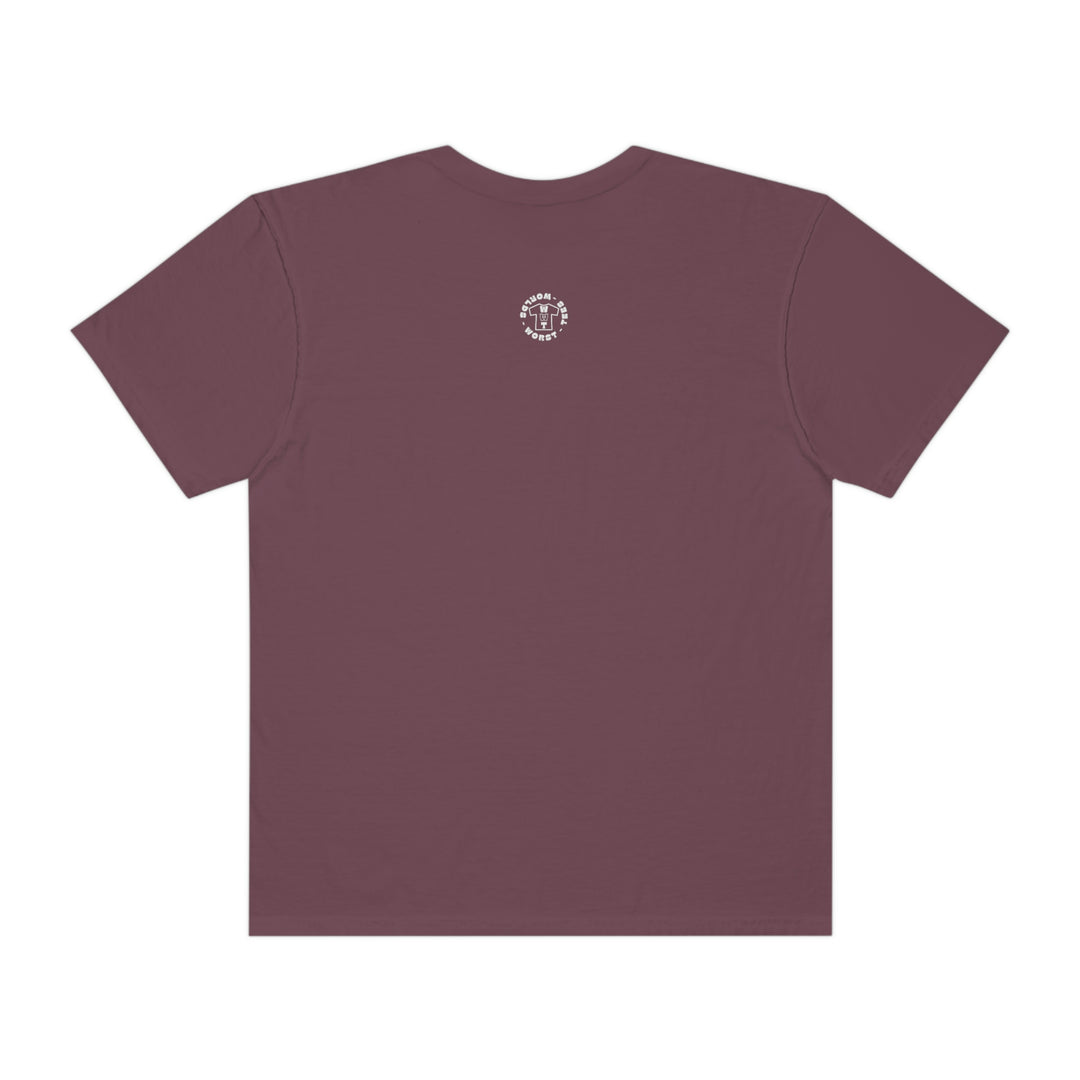 A relaxed fit Jesus Follow Me Tee in purple with white logo. 100% ring-spun cotton, soft-washed, and garment-dyed for coziness. Durable double-needle stitching, no side-seams for a tubular shape.