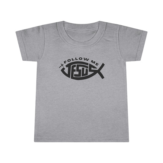 A Jesus Follow Me Toddler Tee with a classic fit and durable design. Features a grey shirt with black text and a graphic logo. Made of 100% Ringspun cotton, 4.5 oz/yd² light fabric.