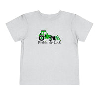 Toddler tee featuring a tractor and clovers design. Made of 100% Airlume combed cotton for comfort. Available in various sizes. From Worlds Worst Tees.