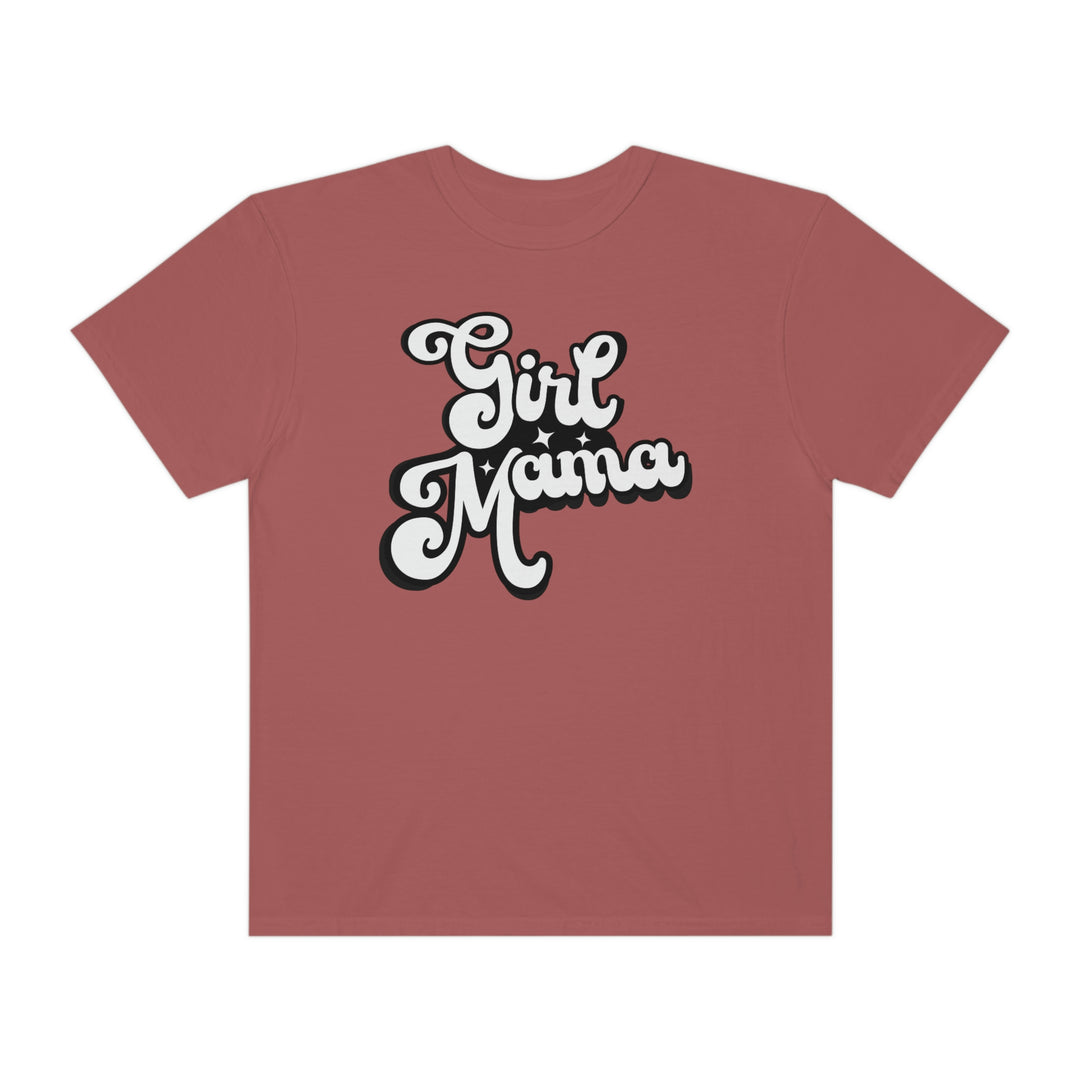 Girl Mama Tee: Red shirt with white text, featuring a black and white cartoon character design. 100% ring-spun cotton, garment-dyed for coziness and durability, with a relaxed fit and double-needle stitching.