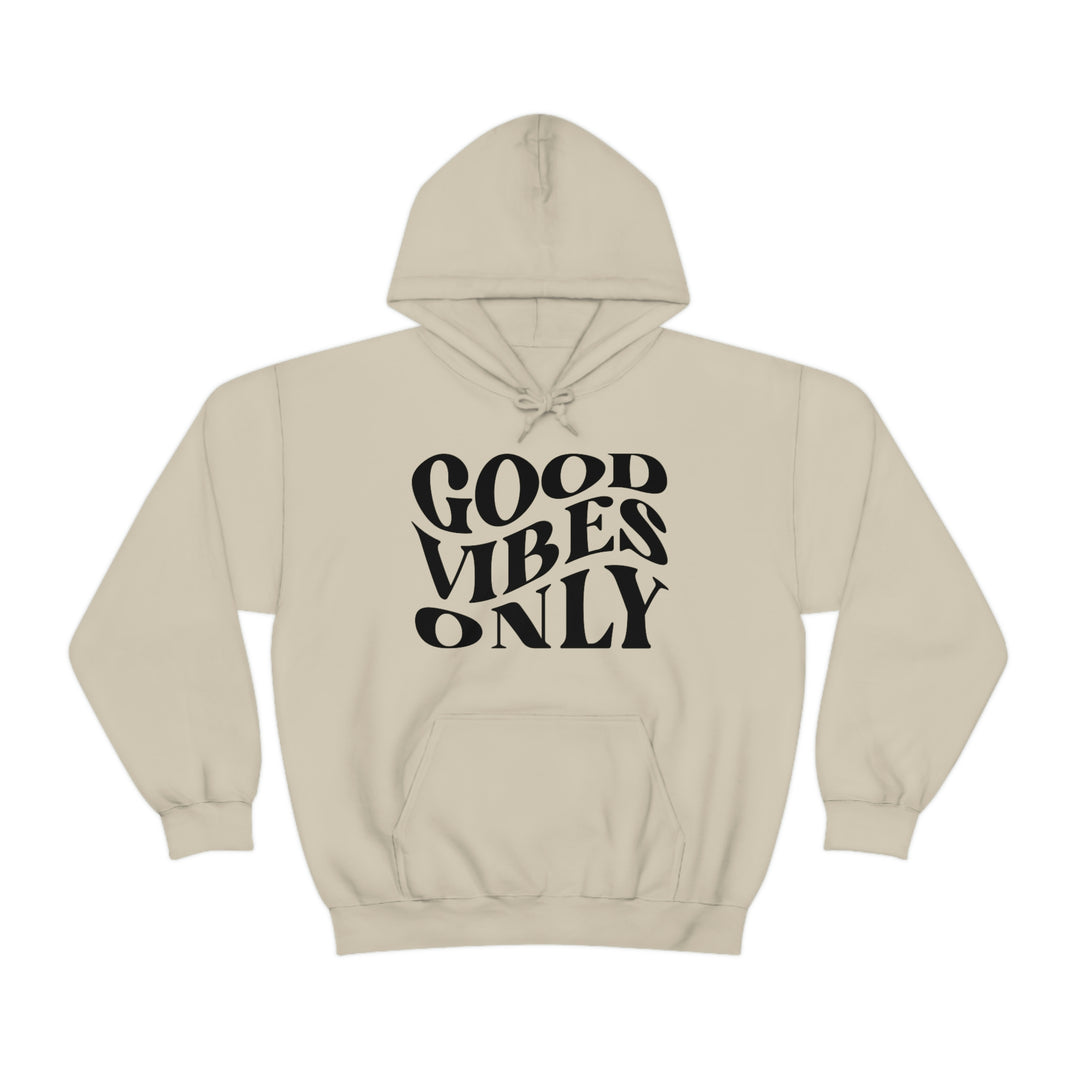 A cozy Good Vibes Only Hoodie in beige with black text, featuring a kangaroo pocket and drawstring hood. Unisex, cotton-polyester blend, medium-heavy fabric, classic fit. Ideal for comfort and style.