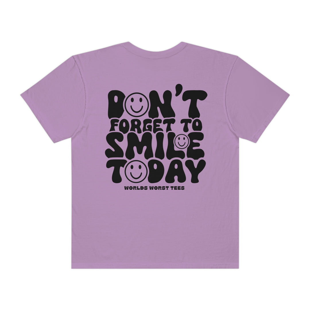 A relaxed-fit, garment-dyed tee made of 100% ring-spun cotton. Features double-needle stitching for durability and a seamless design for a tubular shape. Product title: Don't Forget To Smile Today Tee.