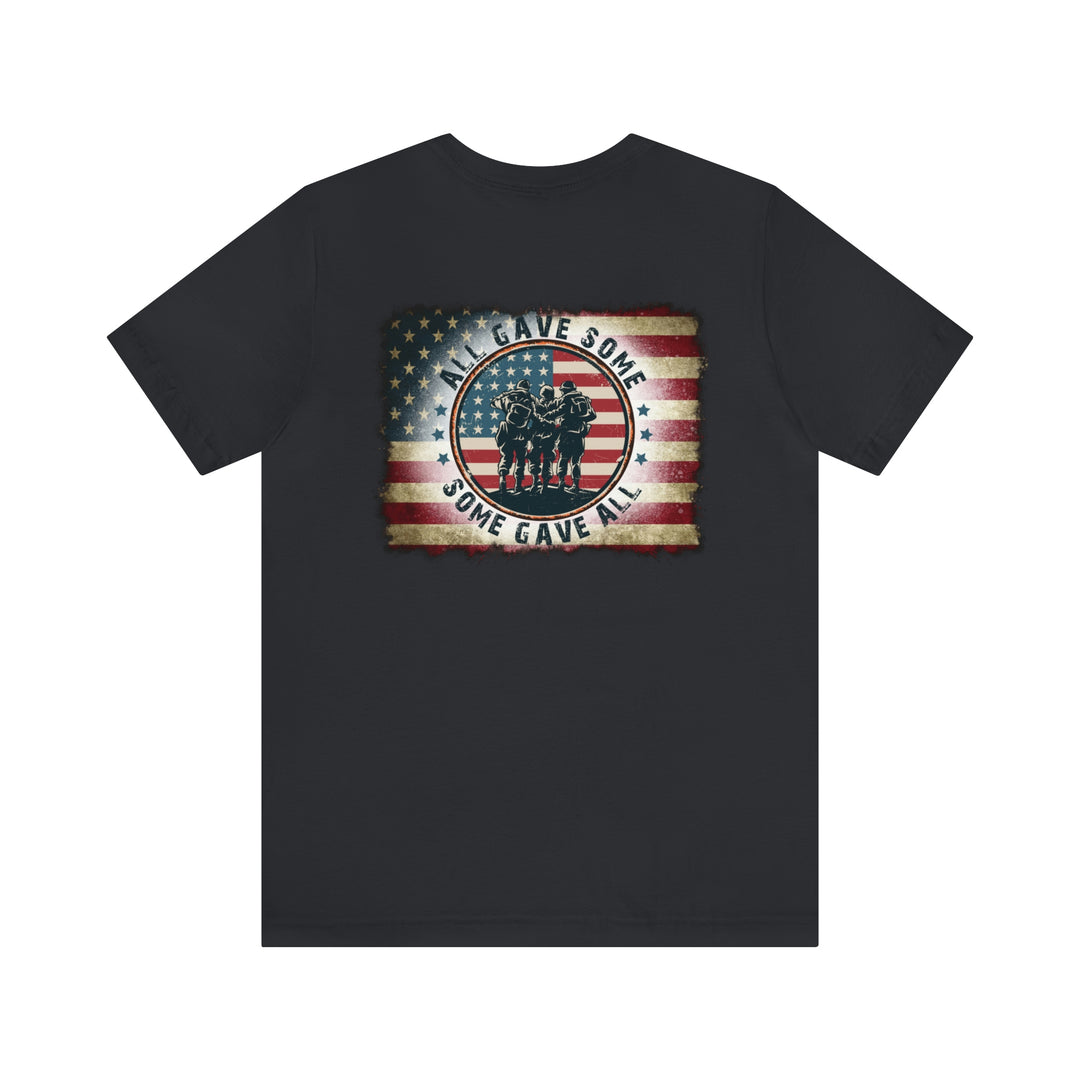 A classic USA Some Gave All Tee, featuring a group of soldiers with a flag on a black shirt. Unisex fit, 100% cotton, ribbed collar, and quality print. Sizes XS to 3XL.