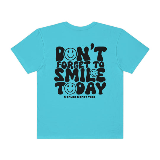A relaxed fit Don't Forget To Smile Today Tee, crafted from 100% ring-spun cotton. Garment-dyed for extra coziness, featuring double-needle stitching for durability and a seamless design. Sizes range from S to 3XL.