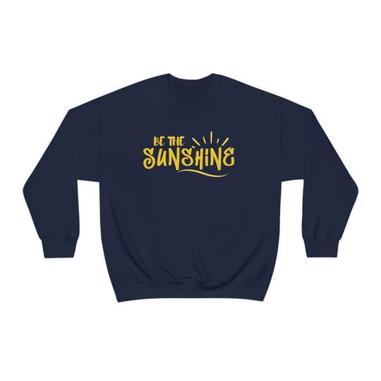A unisex heavy blend crewneck sweatshirt featuring Be The Sunshine design. Made of 50% cotton, 50% polyester, with ribbed knit collar and no itchy side seams. Medium-heavy fabric, loose fit, sewn-in label, true to size.