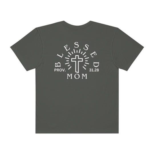 Blessed Mom Tee: Back view of a grey shirt with a white cross and text. 100% ring-spun cotton, garment-dyed for extra coziness. Medium weight, relaxed fit, durable double-needle stitching. No side-seams for a tubular shape.
