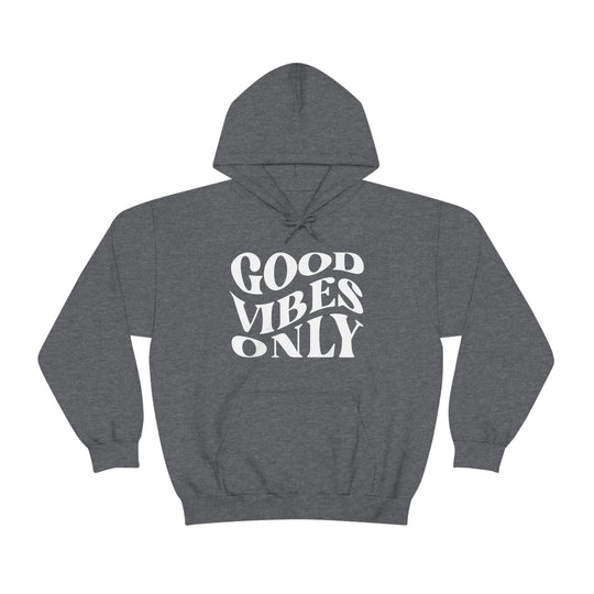 A grey hooded sweatshirt with Good Vibes Only text, a kangaroo pocket, and drawstring hood. Unisex heavy blend of cotton and polyester, medium-heavy fabric, classic fit. Ideal for warmth and comfort.
