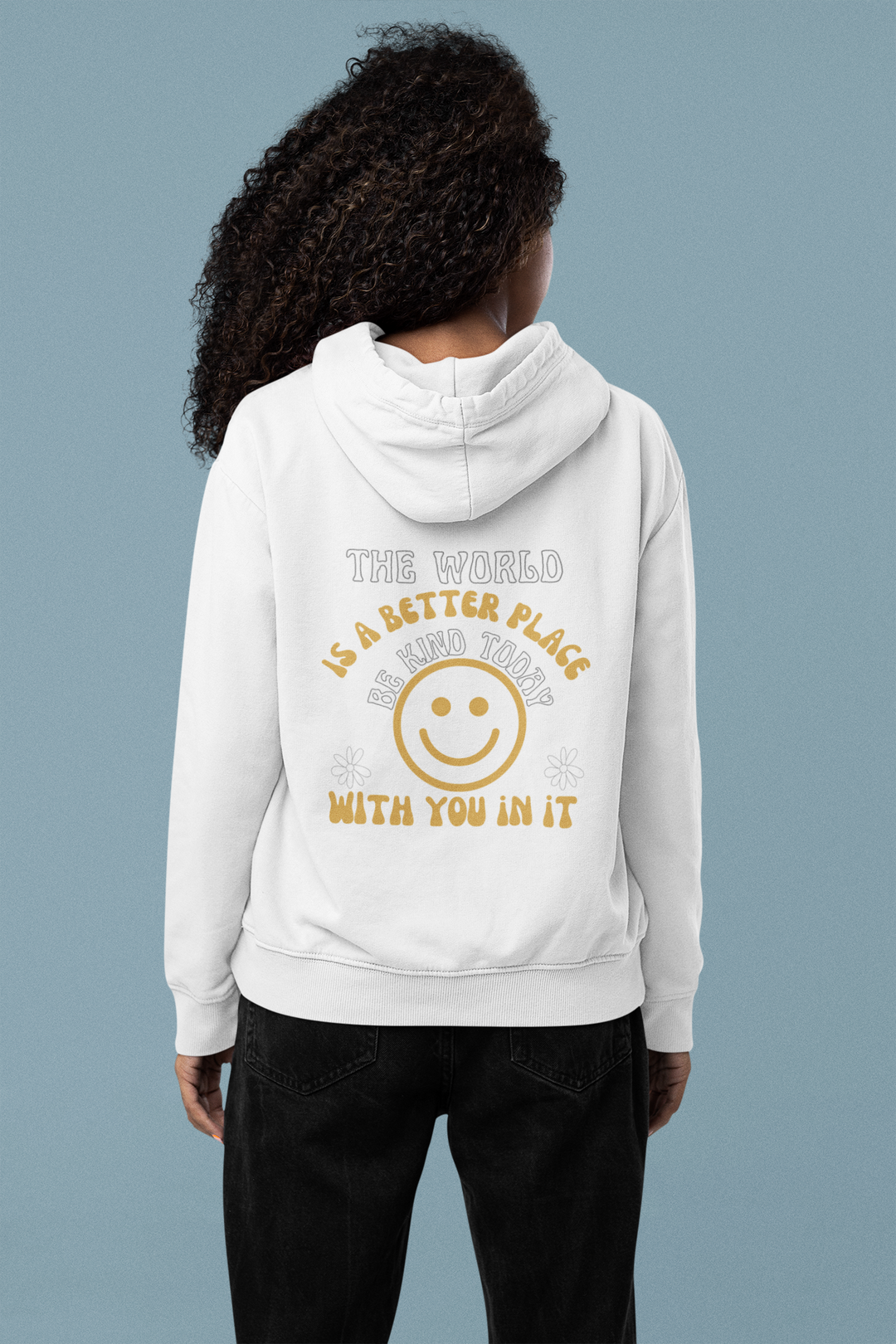 Unisex Be Kind Today Hoodie: White hoodie with smiley face graphic, kangaroo pocket, and drawstring hood. Cotton-polyester blend, no side seams, classic fit. Ideal for warmth and comfort.