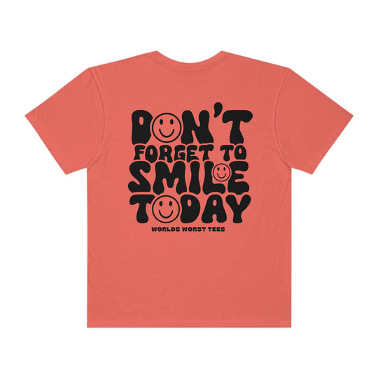 A relaxed-fit, garment-dyed t-shirt made of 100% ring-spun cotton. Features double-needle stitching for durability and a seamless design for a tubular shape. Product title: Don't Forget To Smile Today Tee.