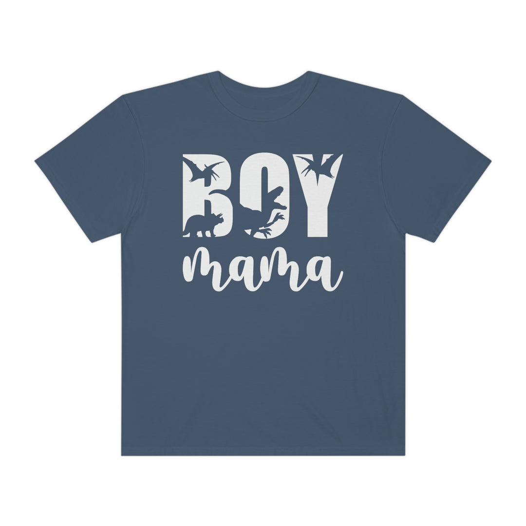 A Total Boy Mama Tee, a blue t-shirt with white text, crafted from 100% ring-spun cotton. Garment-dyed for coziness, featuring a relaxed fit and durable double-needle stitching. Ideal for daily wear.