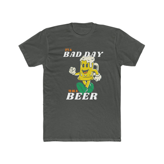 A grey t-shirt featuring a cartoon character of a beer mug and a fist, embodying the title It's A Bad Day to be a Beer Tee. Made of 100% ring-spun cotton with a relaxed fit and durable double-needle stitching.