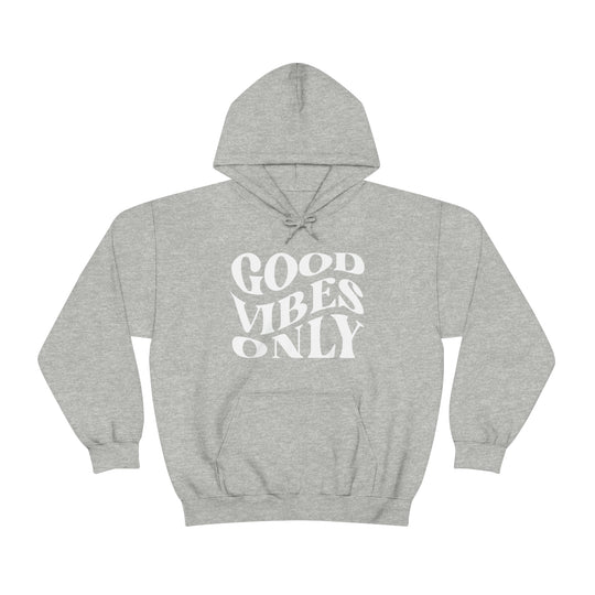 A grey hooded sweatshirt with Good Vibes Only text, a kangaroo pocket, and drawstring hood. Unisex, cotton-polyester blend, medium-heavy fabric, classic fit, tear-away label. From Worlds Worst Tees.