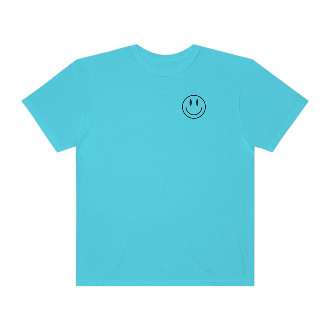 Blue t-shirt featuring a smiley face design. 100% ring-spun cotton, garment-dyed for extra coziness. Relaxed fit, double-needle stitching for durability. From 'Worlds Worst Tees'.