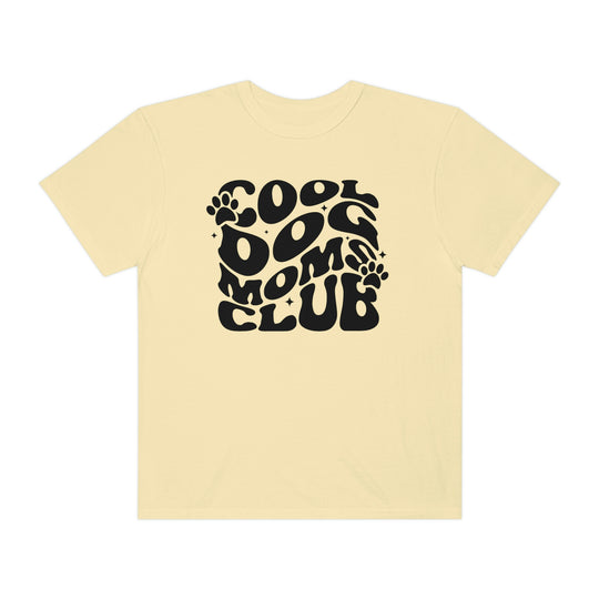 Cool Dog Mom's Club Tee: Yellow t-shirt with black text and logo. 100% ring-spun cotton, garment-dyed for extra coziness. Relaxed fit, double-needle stitching for durability. No side-seams for a tubular shape.